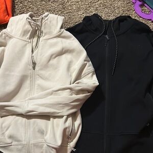 White and Black Zip-Up Hoodies